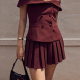 Set de top cu blazer cu umeri goi și fustă plisată