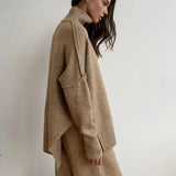 Set tricotat cu guler înalt și pantaloni